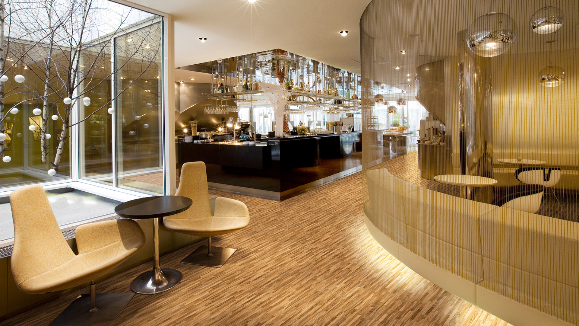 Upscale bar interior with polished wood flooring